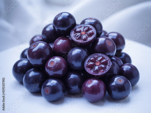 Wallpaper Mural Pile of Vibrant Purple Acai Berries One Cut Open purple berries Torontodigital.ca