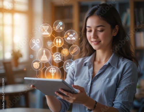 A woman looking at a tablet with floating icons representing various concepts in a well lit environment