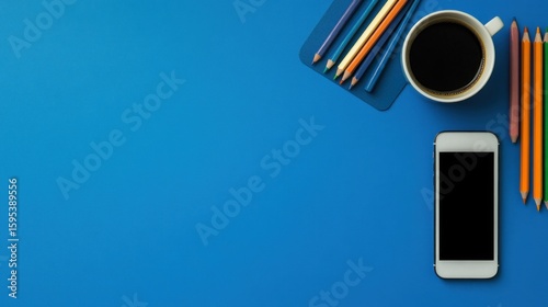 Workspace top view with coffee pencils smartphone