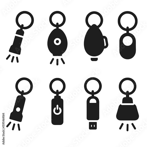 Keychain Flashlight Icons. Solid style icons of keychain flashlights: micro torch, tiny LED, clip-on light, keyring icon, quick