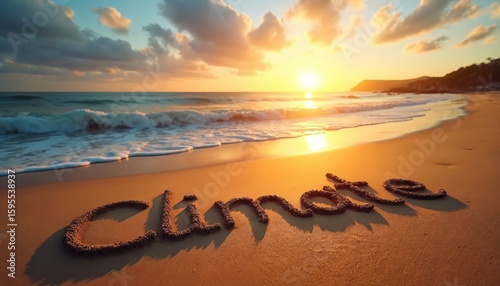 The word CLIMATE is written in the sand on a beach during a beautiful sunset. Gentle waves wash ashore, symbolizing rising sea levels and environmental concerns.