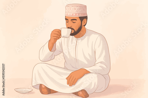 A man wearing traditional Omani clothing sits cross-legged while drinking from a white cup, with a saucer nearby.