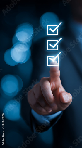 Businessman finger selecting checklist items achieving success completing tasks and focusing on goals and achieving business objectives in a corporate environment