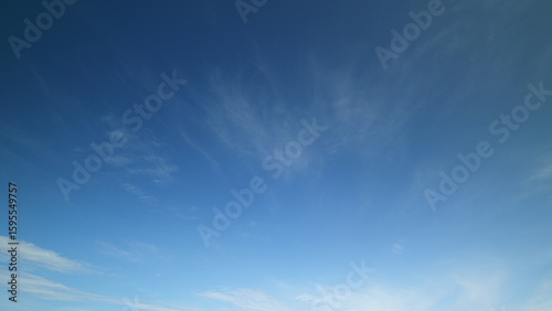 Time lapse. The Serene Blue Sky Filled with Wispy Clouds An Atmosphere of Total Peacefulness