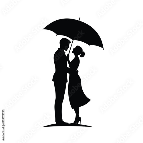 Romantic silhouette of a couple kissing under an umbrella in black and white
