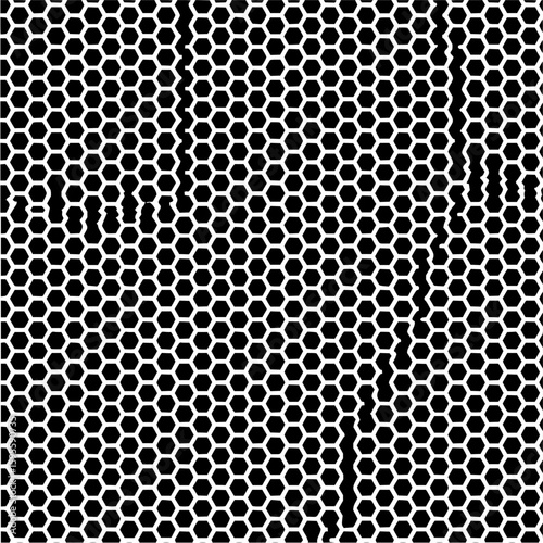 Honeycomb pattern with irregular voids creating a textured black and white abstract design element