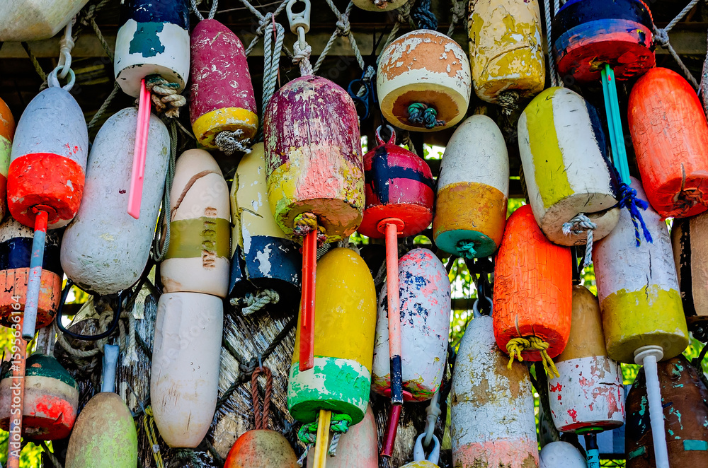 Obraz premium Colorful styrofoam buoys in Apalachicola Florida, nautical background pattern