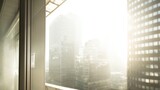 Sun drenched blurred cityscape through an open window on high floor