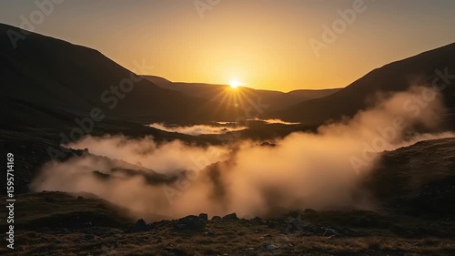 Sunrise over a valley with steam rising from the ground