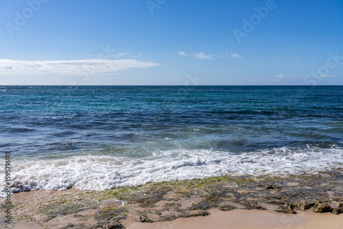 Fototapeta Naklejka Na Ścianę i Meble -  Laniakea Beach - Popularly Known as Turtle Beach, Haleiwa, Oahu, Hawaii. North Shore of Oahu Island. Pacific ocean.