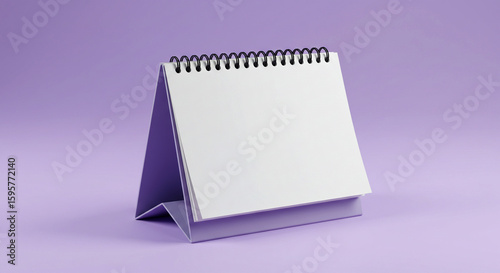 Desk calendar mockup featuring a spiral binding and blank white pages, perfect for showcasing schedules, appointments, and organizational tools.