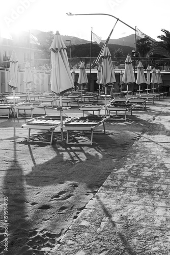 Black & white beach by the Tyrrhenian sea, Liguria, Italy