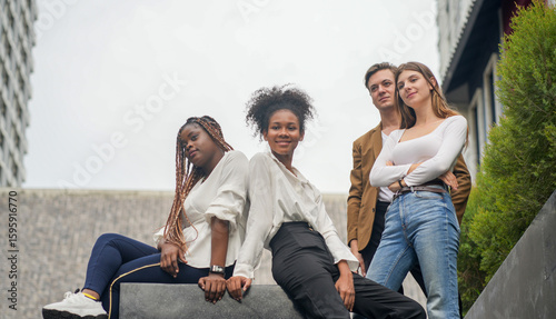 Confident diverse people posing together outdoors