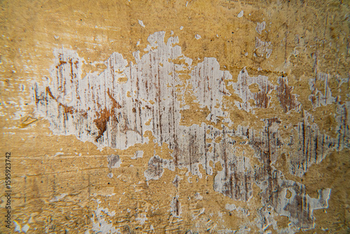 cracked yellow wall