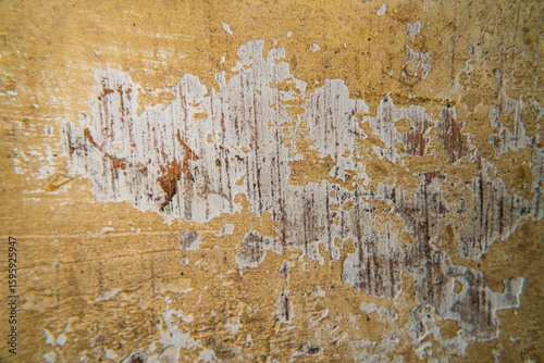 cracked yellow wall