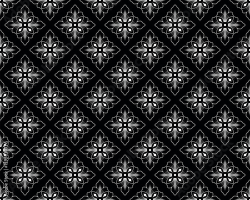 Flower geometric pattern. Seamless vector background. White and black ornament.