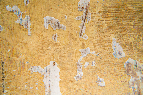 cracked yellow wall