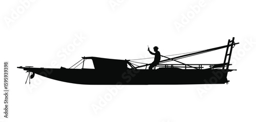 Silhouette of a fishing boat with a fisherman on deck at sea