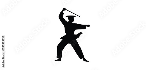 Silhouette of a martial artist in a dynamic pose with a staff
