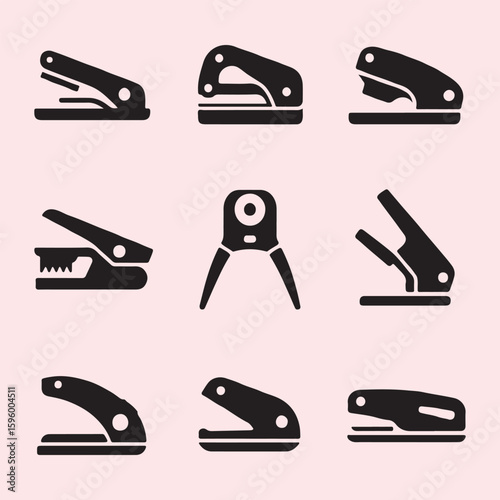 Collection of Black Office Punches and Staplers
