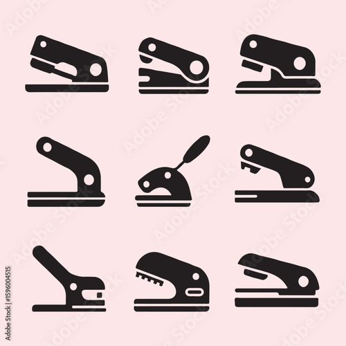 Collection of Black Office Punches and Staplers
