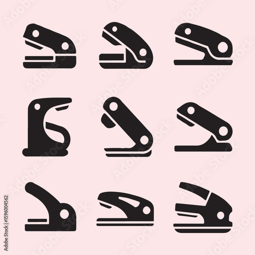 Collection of Black Office Punches and Staplers
