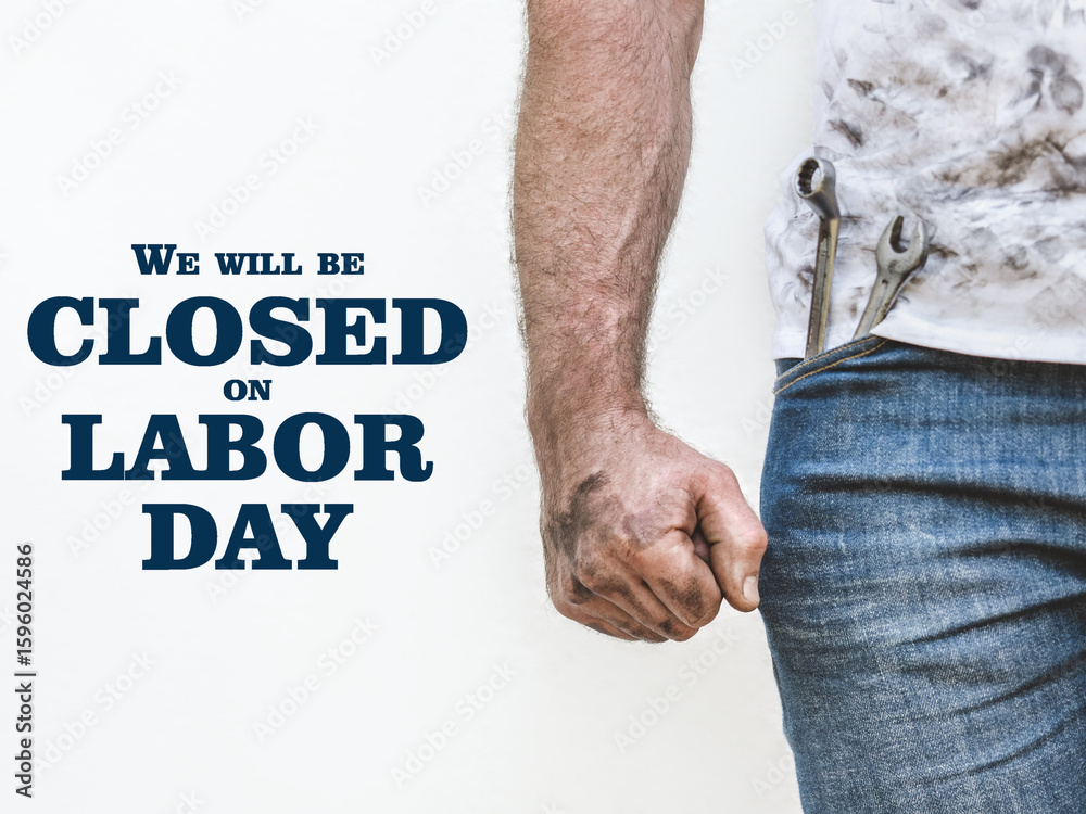 Fototapeta premium Signboard with the inscription We will be closed on Labor Day. Holiday preparation concept