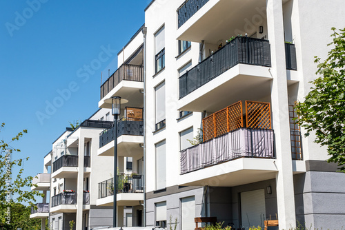 White multi-family residential building seen in Berlin, Germany
