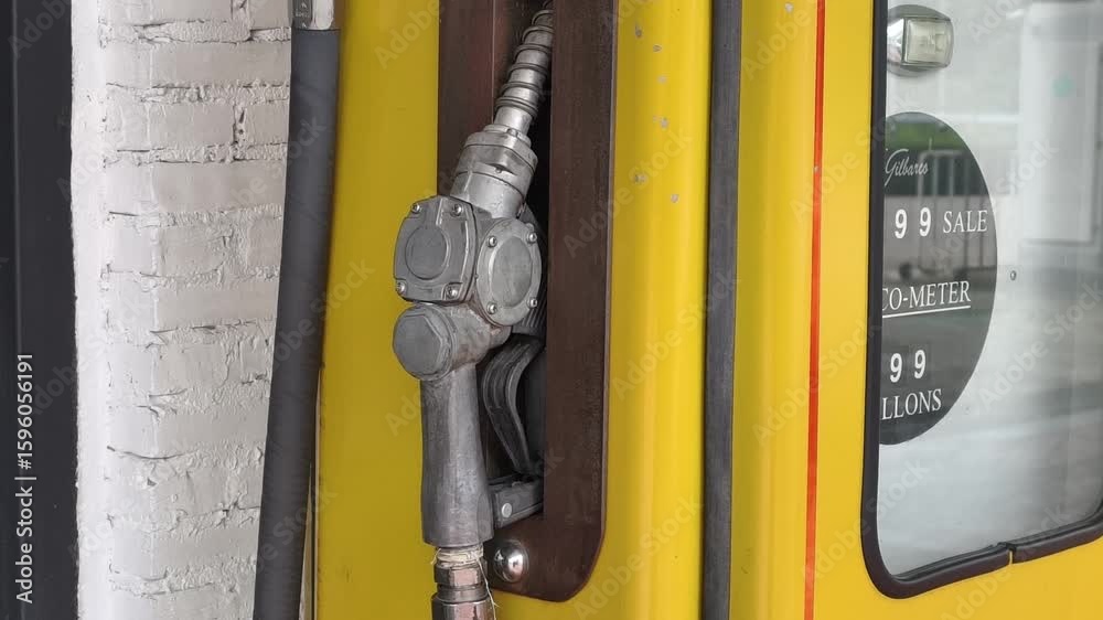Ancient petrol oil pump dispenser