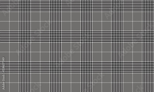 Seamless plaid pattern, gray, white, black, conveys a simple and elegant style, suitable for textile design, clothing, skirts or pants that emphasize coolness and simplicity.