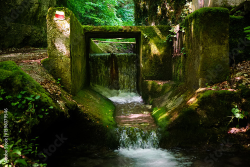 Small water stream and waterfall in Rio Fuggio path, Leonessa, Rieti, Lazio, Italy