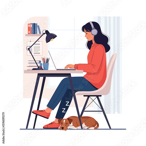 A young woman with headphones works on a laptop at her desk while her dog sleeps peacefully underneath.
