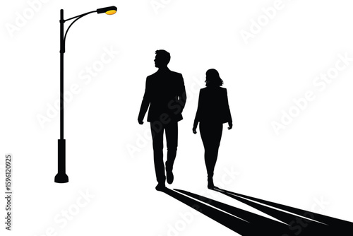 silhouettes of people walking on the street