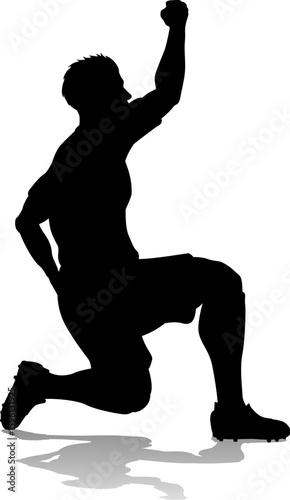 A soccer or football player male silhouette man