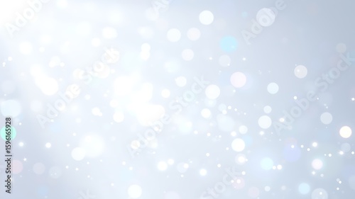 Abstract blurred white and light blue bokeh background with sparkles and shimmering effects