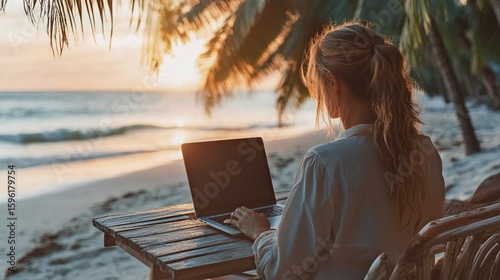 Fototapeta Naklejka Na Ścianę i Meble -  Remote work on tropical beach during vacation