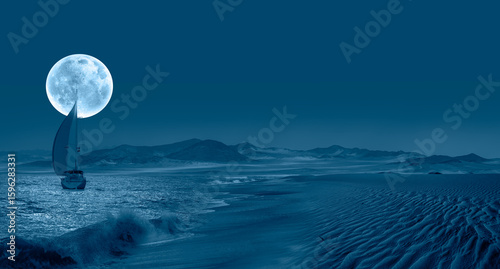 Fototapeta Naklejka Na Ścianę i Meble -  White lonely yacht is sailing near coast full moon in the background at night - Namib desert with Atlantic ocean meets near Skeleton coast - Namibia 