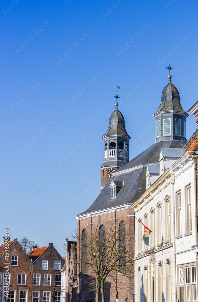 Fototapeta premium Facades and church towers in the historic center of Ravenstein, Netherlands