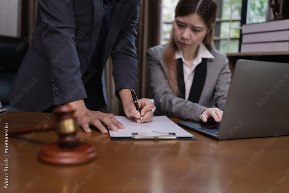 Two Lawyer with Document Paper and Hammer on Wood table, Judge's Gavel, Law, Justice Symbol, Agreement and Partnership Concept, Two Lawyer with Document Paper and Hammer on Wood table, Judge's Gavel, Law, Justice Symbol, Agreement and Partnership Concept,