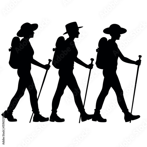 Three hikers with backpacks and trekking poles walking together
