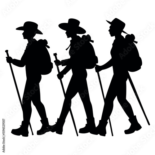 Three hikers with backpacks and trekking poles walking together