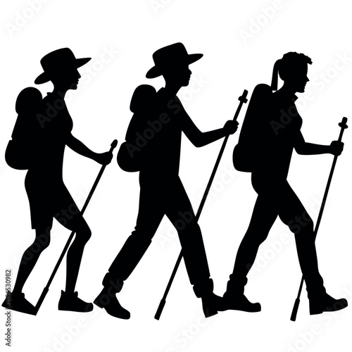 Three hikers with backpacks and trekking poles walking together