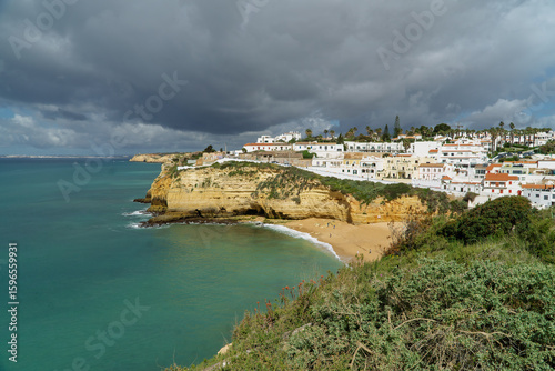 Fototapeta Naklejka Na Ścianę i Meble -  Sandy beach under the cliffs in Albufeira