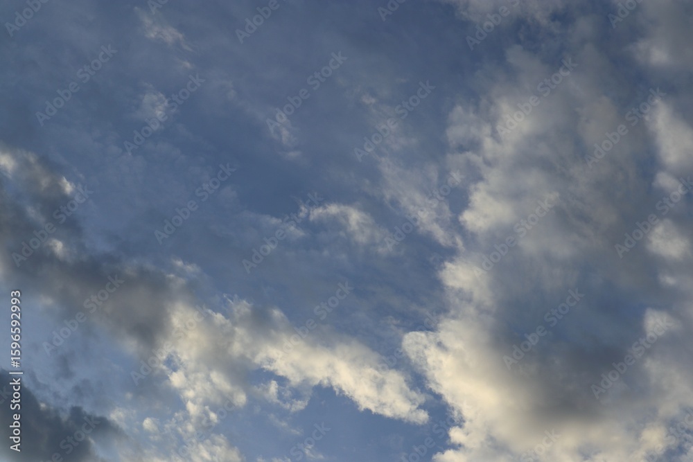 Fototapeta premium Ethereal Skies Softly Painted a dreamlike atmospheric perspective with billowy clouds and serene