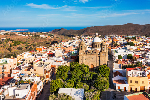 Wallpaper Mural Aguimes town in Gran Canaria, Canary Islands, Spain. Historic centre of Aguimes (Gran Canaria). Typical traditional street of the Canary Islands. Colourful town of Aguimes, Gran Canaria, Spain. Torontodigital.ca