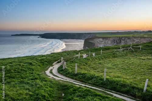 Vibrant sunrise landscape i...