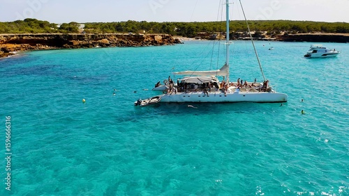 Aerial view of anchorage in the turquoise waters of Cala Saona, in the Spanish Mediterranean island of Formentera. 