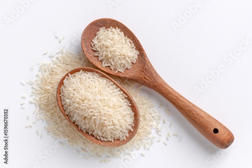 Rice Grains on Wooden Spoon and Bowl