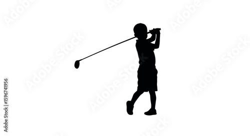 Silhouette of a young boy playing golf with a driver in mid-swing pose