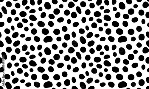 Black oval spots on white background pattern